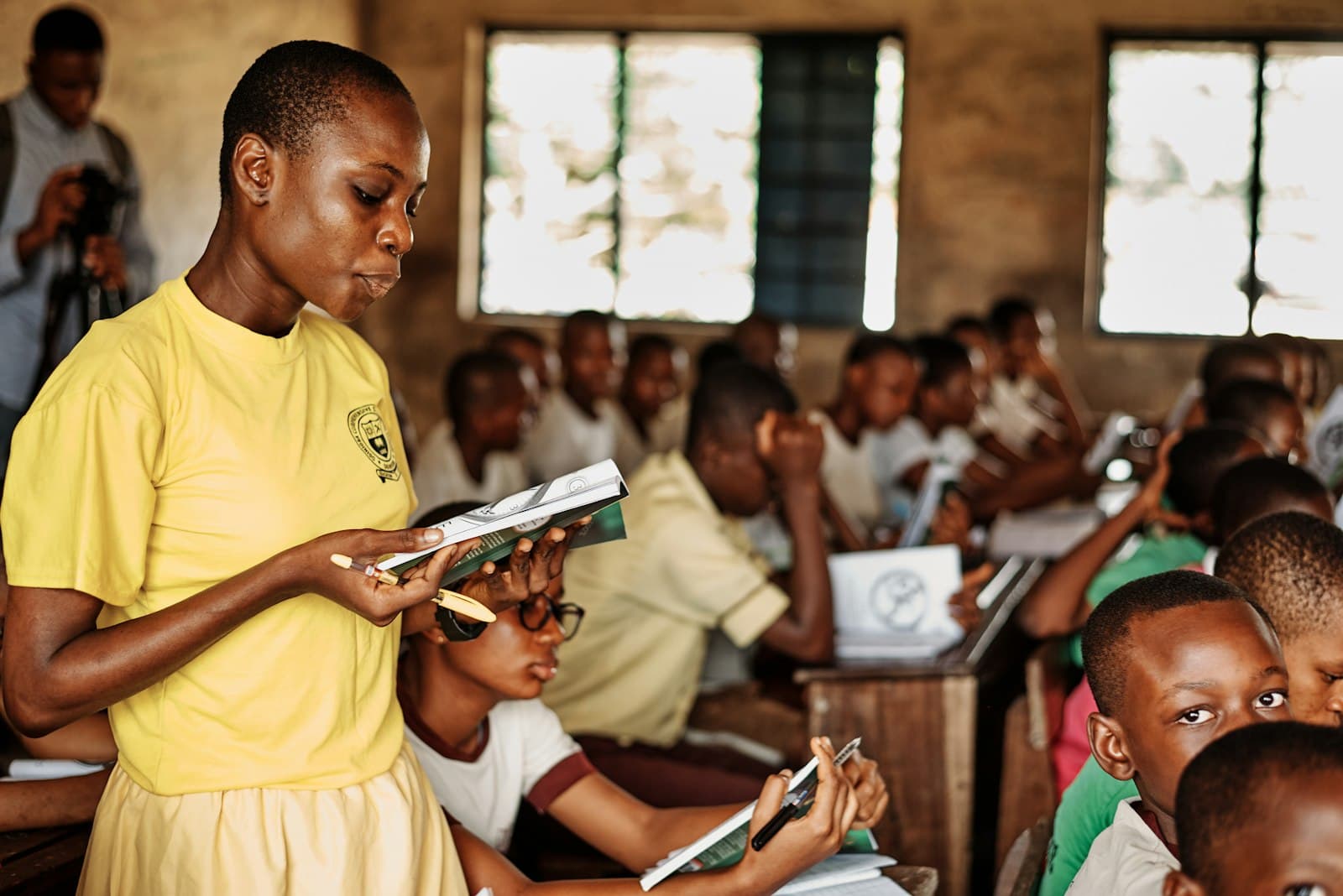 A teacher guiding pupils through a lesson